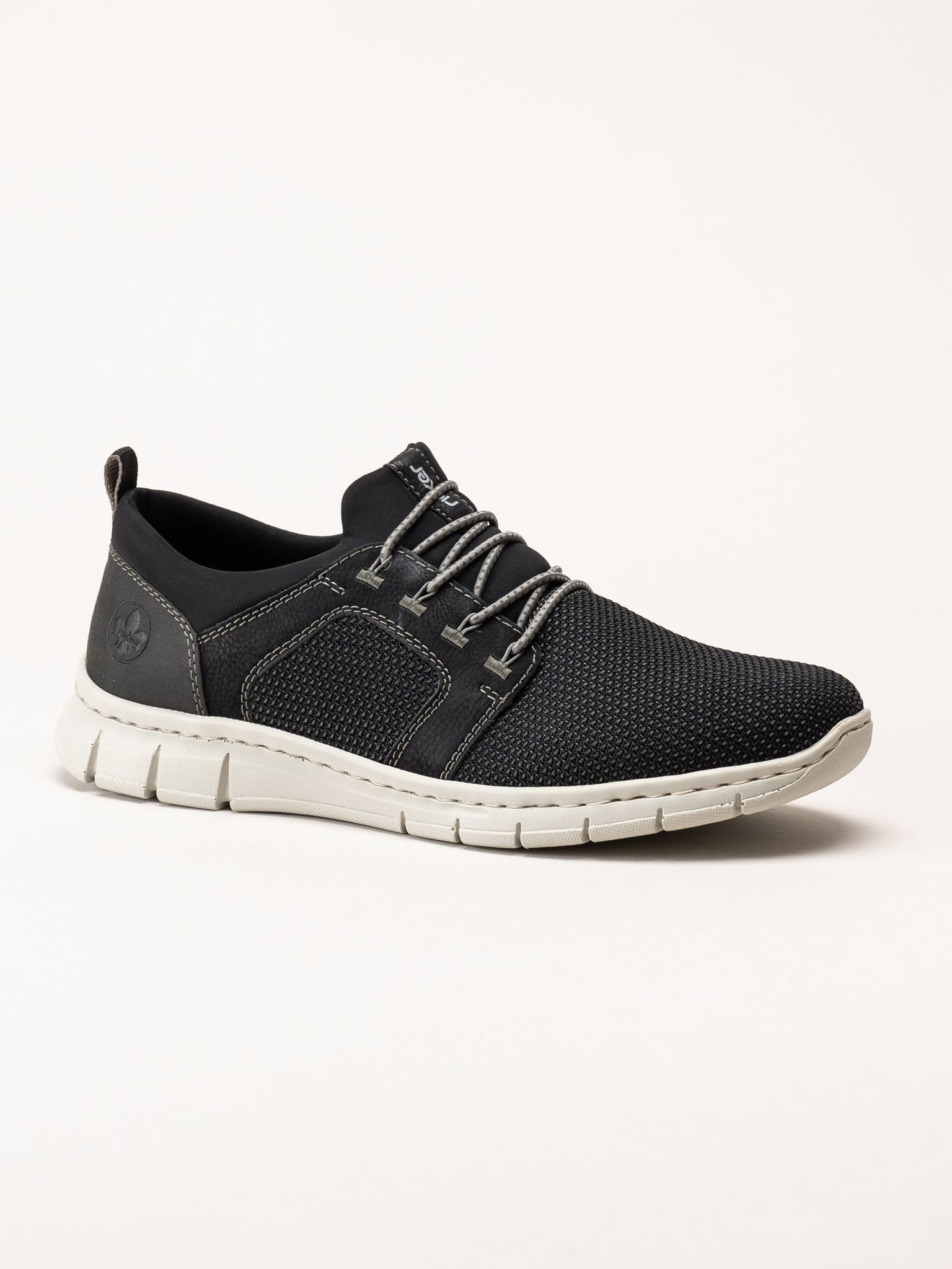 Rieker - Svarta sportiga slip on skor