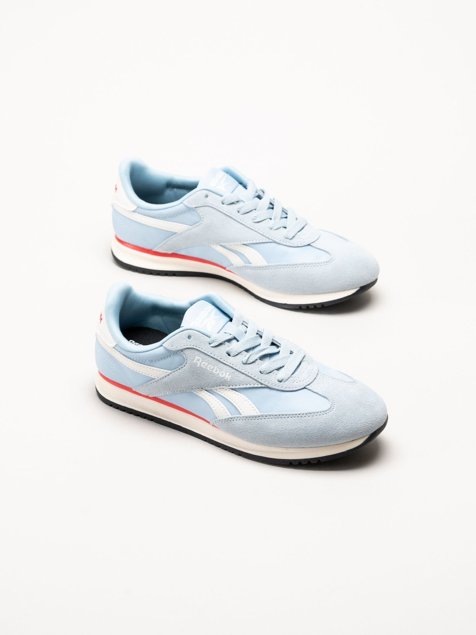 Reebok - World 70 - Ljusblå sneakers i nylon och mocka