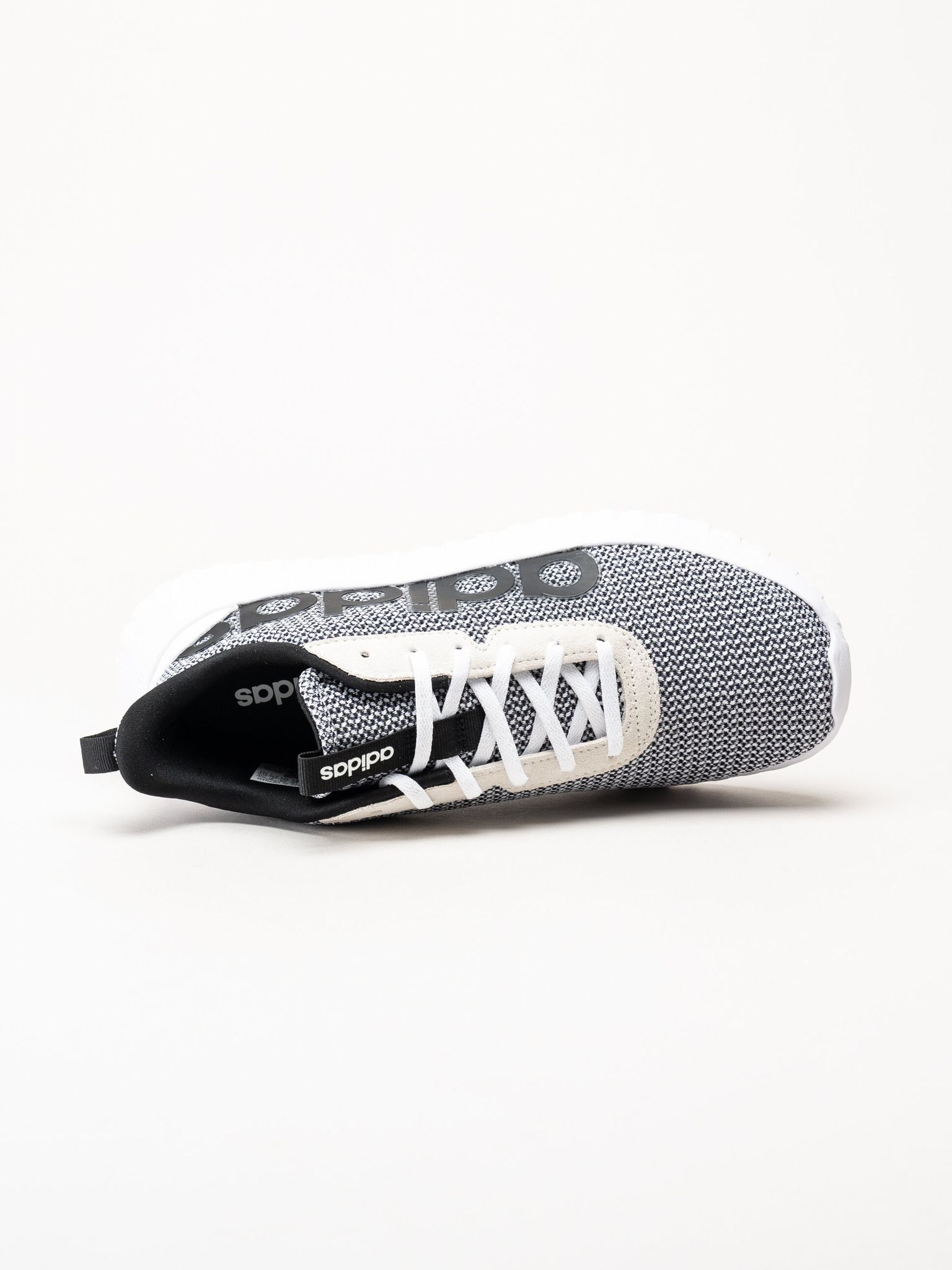 Adidas - Kaptir Base - Svartvita sneakers i textil