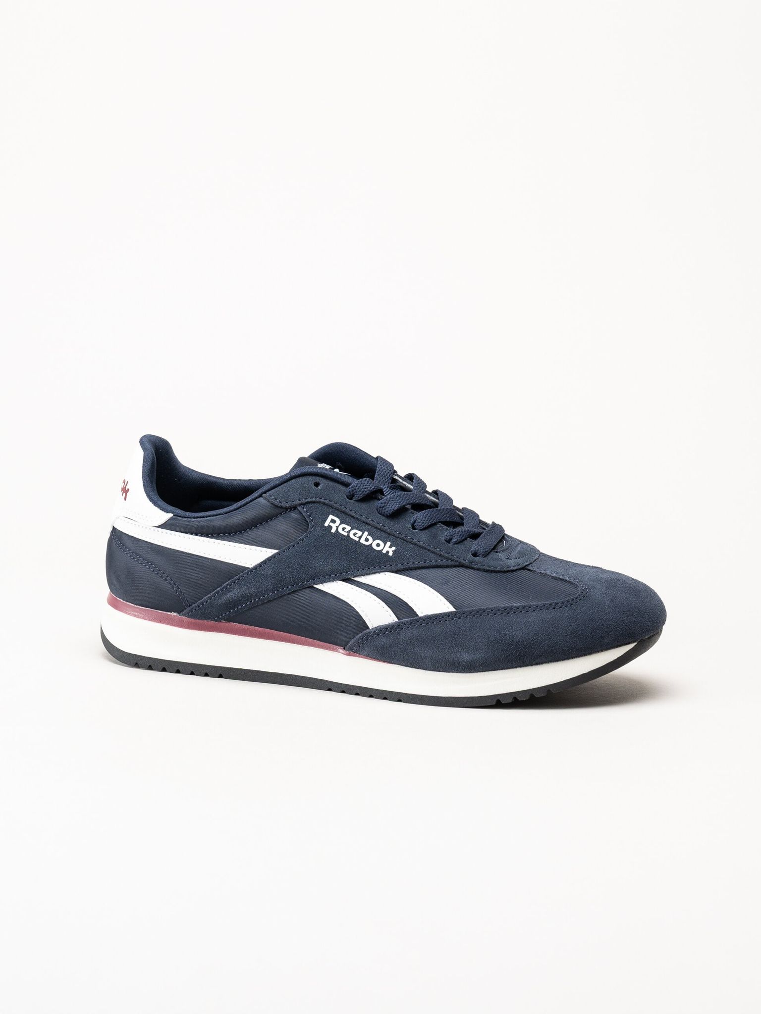 Reebok - World 70 - Mörkblå sneakers i mocka och textil