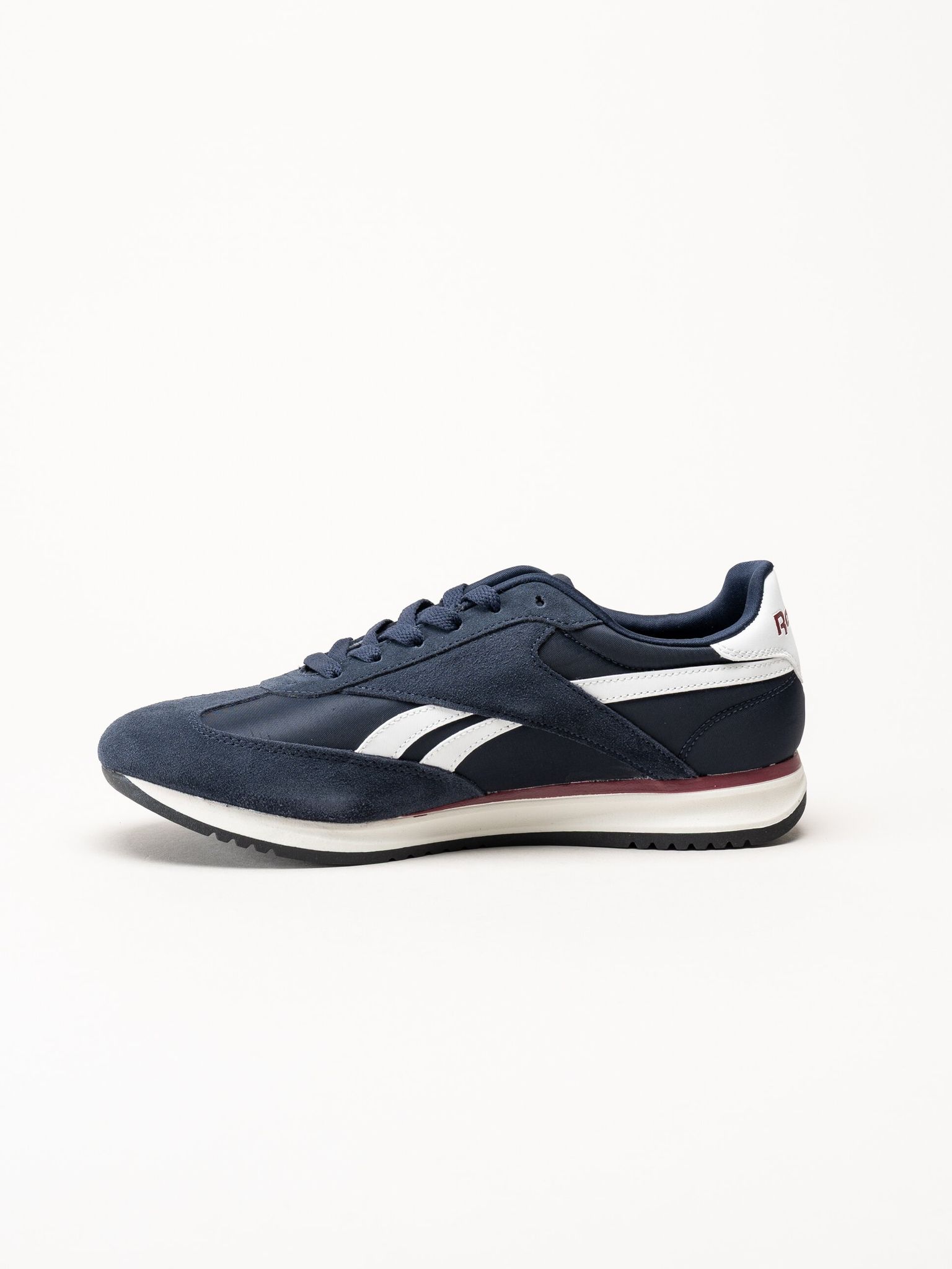 Reebok - World 70 - Mörkblå sneakers i mocka och textil